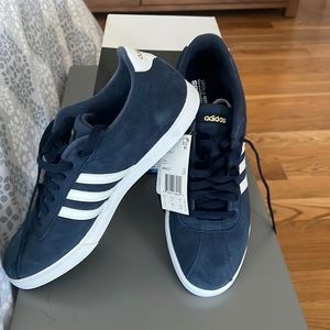 Men’s Adidas Courtset sneaks.